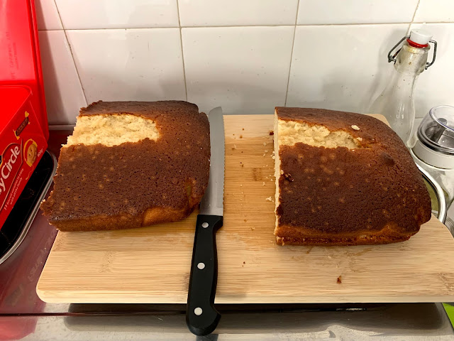 A rectangular cake cut in half down the middle