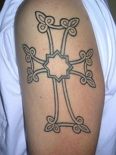 cross tattoos on arm