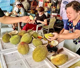 Villagers selling durians at Pulau Ubin