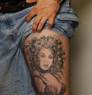 female tattoos on thigh