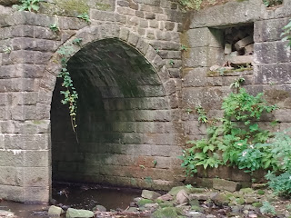 <img src="Mayroyd Mill.jpeg" alt=" image of the ruined wall near Hebden Bridge" />