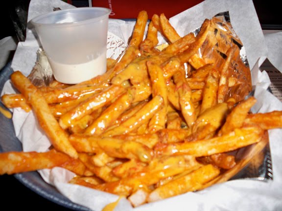 cheese fries. spices on the cheese fries