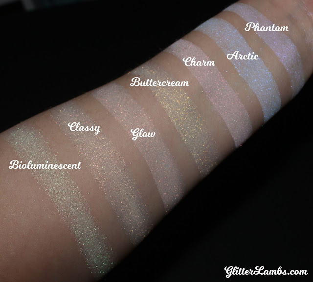 Glitter Lambs Loose Highlighters Swatch  Pictured above is:  Phantom- (purple flash) Buy  Arctic - (blue flash) Buy  Charm - (magenta flash) Buy  Buttercream - (gold flash) Buy  Glow - (coppery flash) Buy  Classy - (orange flash) Buy  Bioluminescent - (green flash) Buy