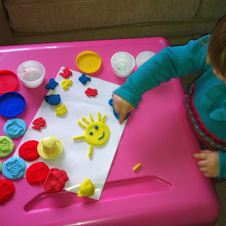 child making crafts with playdoh