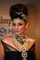 Raveena Tandon walks with Black outfit and Jewellery for Raj Mahtani at HDIL Fashion Show