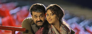 Amala Paul with mohanlal in runbaby run