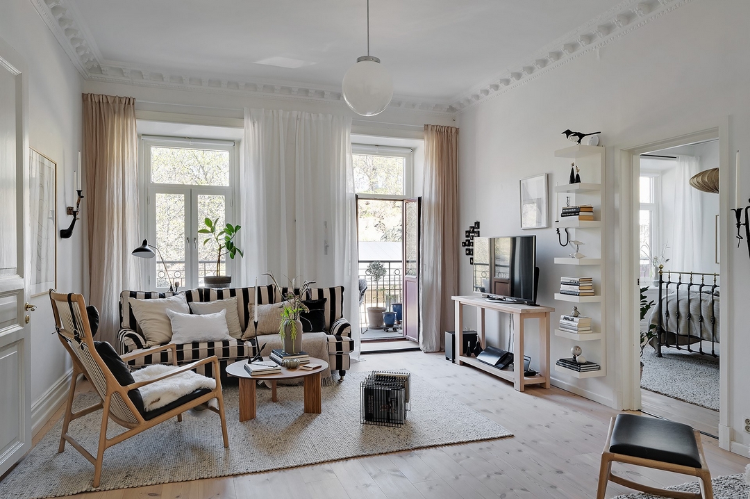Décoration beige et douce dans un appartement ancien en Suède
