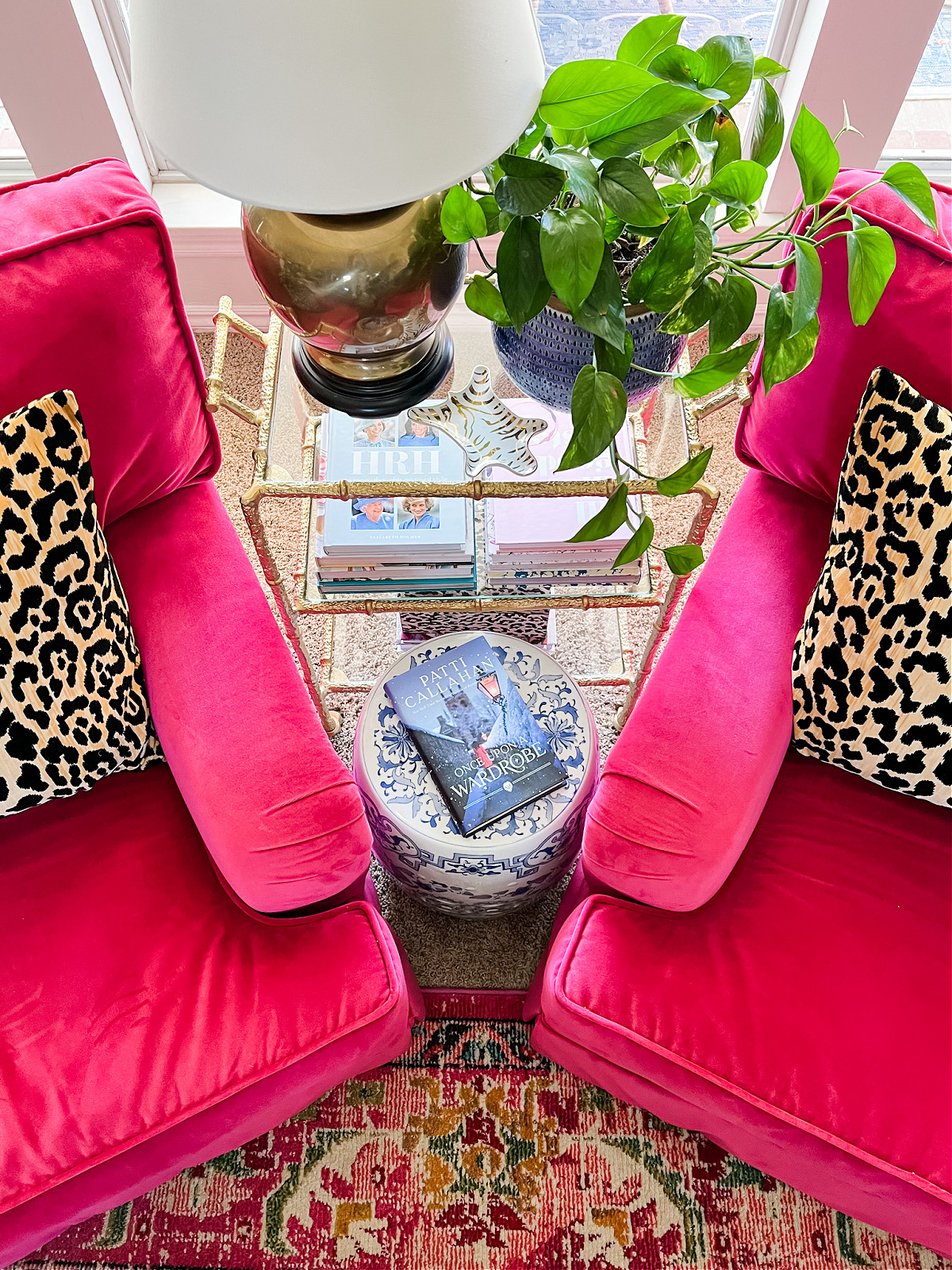 pink club chairs with books on end table- Once Upon A Wardrobe book