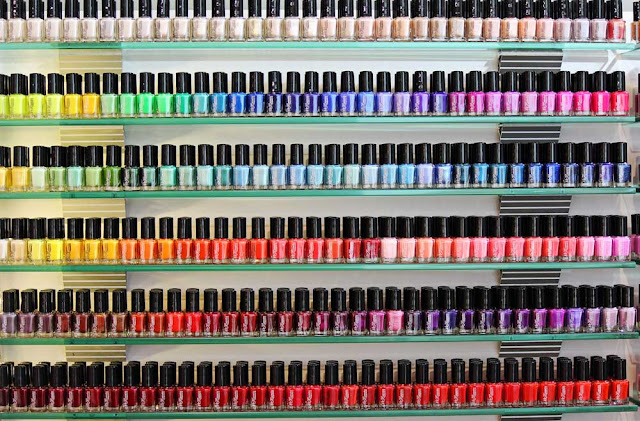 nail enamel in a row on a shelf