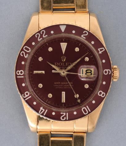 vintage rolex gmt master yellow gold brown bakelite