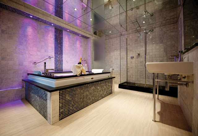 Modern bathroom with purple lighting 