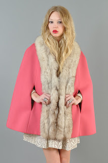Vintage 1960's hot pink Lilli Ann cape with fox fur trim.