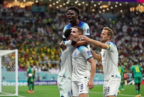 Round of 16 matchup between England and Senegal during the 2022 FIFA World Cup in Qatar will take place on December 4 at Al Bayt Stadium in Al Khor, Qatar. Jordan Henderson of England celebrates with teammates after scoring their first goal.