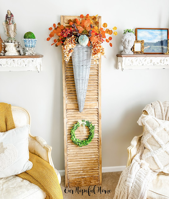 French farmhouse shutter and wicker wall basket