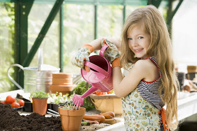 baby-giving-water-to-flowers-nice-snaps