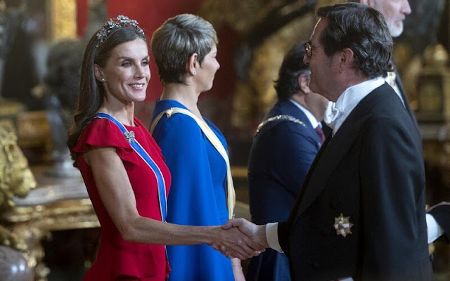 Queen Letizia wore a new red peplum maxi dress. Diamond tiara. Diamond earrings. Colombian First Lady Veronica Alcocer