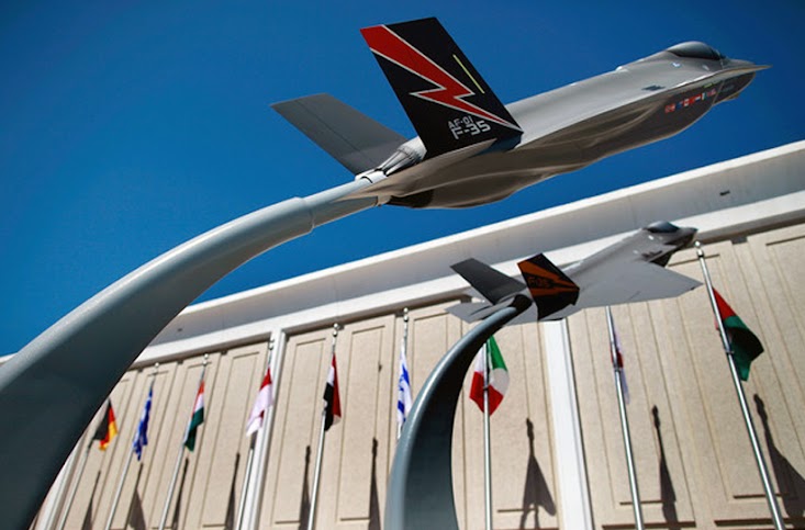 Outside the Lockheed Martin Corporation in Fort Worth, Texas, plane replicas stand.