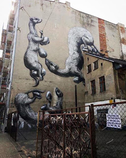 Graffiti urban street art rodents family theme by Roa