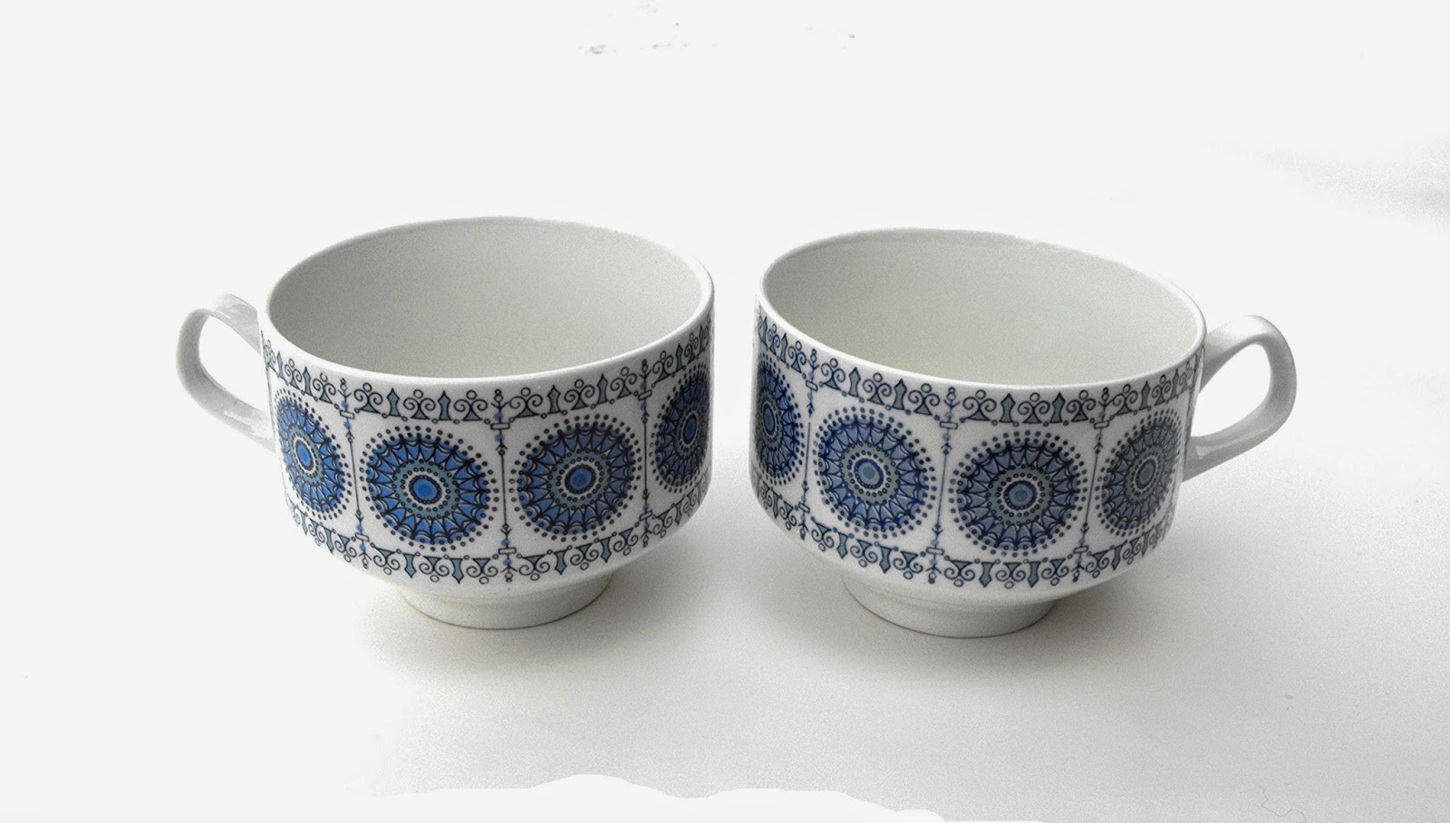 https://www.etsy.com/listing/180261727/50s-blue-seafoam-tea-cups-porcelain-mugs?ref=shop_home_active_16&ga_search_query=cup