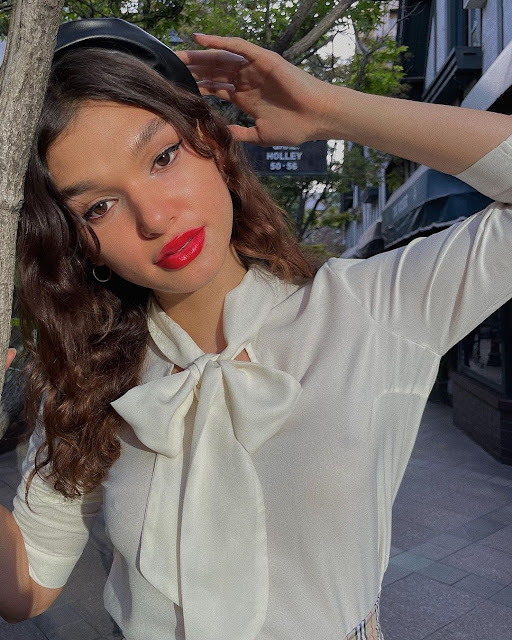 Helénia Melán – Most Beautiful Transgender Women's in a Shirt Blouse and Tennis Skirt Fashion Style