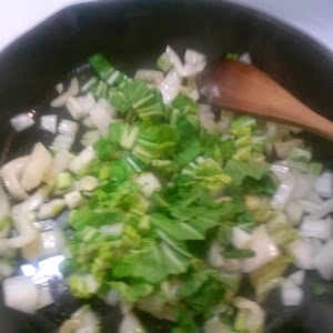 add the bok choy greens and scallion whites