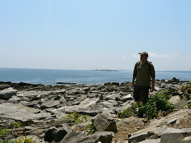 hiker strolls along Seashore Ave