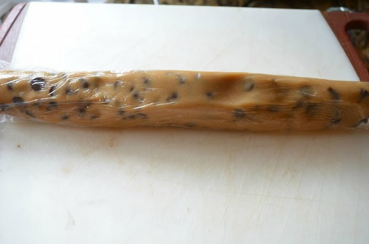 A roll of Egg Free Chocolate Chip Cookie Dough.