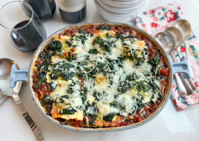 Food Lust People Love: Using filled fresh ravioli instead of lasagna noodles, this easy ravioli lasagna is flavored with hot Italian sausage, spinach and a rich tomato sauce.