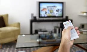 رجل يشاهد تليفزيون - يمسك ريموت كنترول - man watch tv hold remote control