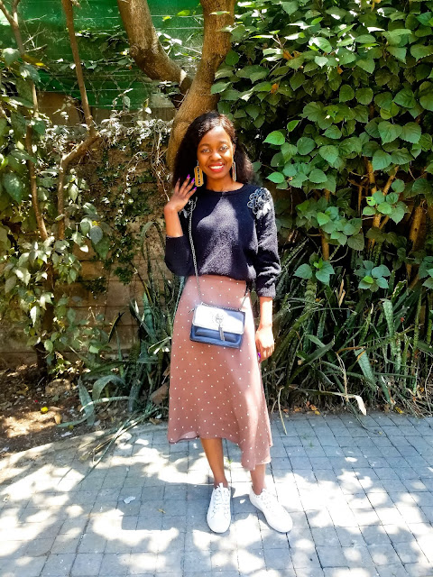 How To Wear A Midi Skirt With Sneakers