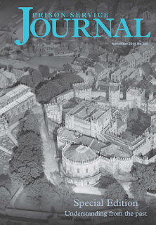 Black and white aerial image of a castle or prison complex, overlaid with text in blue: Prison Service Journal November 2019, No 246, Special Edition: Understanding from the past