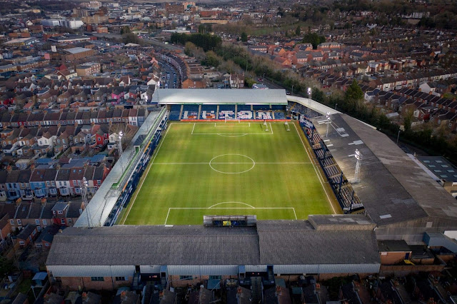 a beautiful aerial photo of kenilworth road football stadium set in a residential housing estate