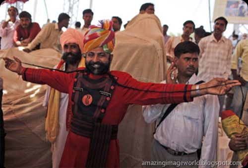 The winner showing his moustache