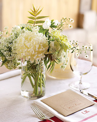 Small gorgeous centerpieces incorporating wild looking flowers