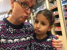 Mum and daughter in matching Christmas jumpers
