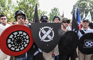 Pictured marching with white supremacists moments before attack: Murder suspect, 20, accused of plowing his car into protesters at anti- fascist rally in Virginia, killing one and injuring 19