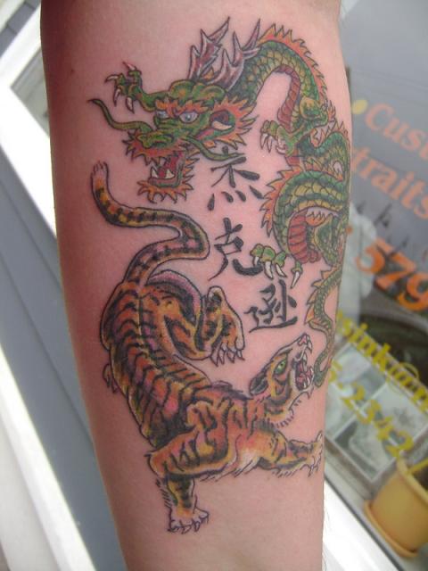 Dragon Tiger Tattoo On Arm Dragon Tiger Tattoo is the best tattoo 