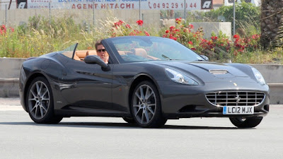 Hugh Grant Cruising in His Ferrari California