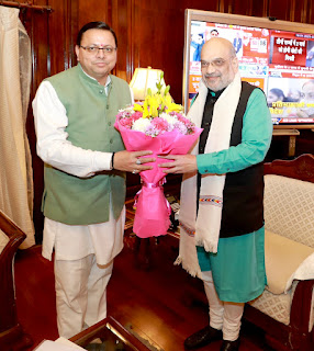 CM dHaami and Amit Shah