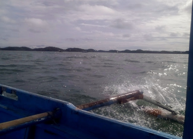 The cool calm water of Lingayen Gulf where the islands are scattered