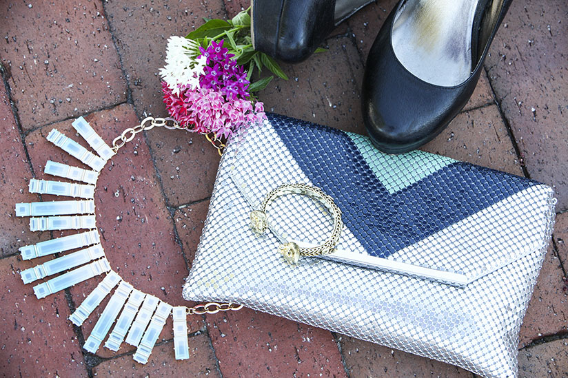 The skinny dip necklace from bauble bar and a metallic clutch by Jessica McClintock