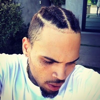 Chris Brown rocks conrows.