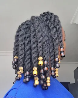 Two-Strand Twists Hairstyle  with bead at the end