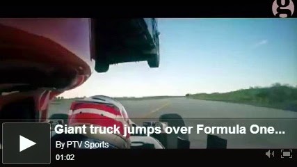 http://funkidos.com/videos-collection/amazing-videos/giant-truck-jumps-over-formula-one-car