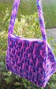 http://www.ravelry.com/patterns/library/orchard-mist-purse