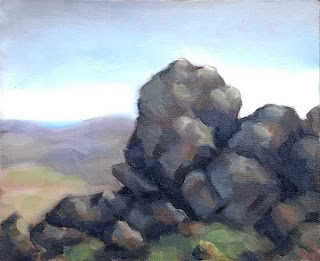 Landscape oil painting of a basalt outcrop with distant rolling hills.