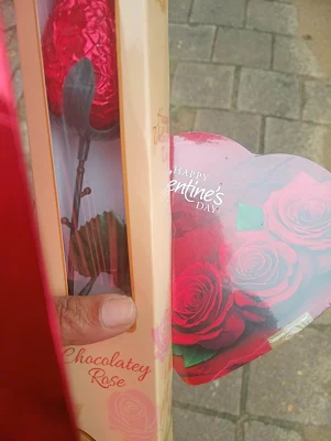 "Chocolate rose and heart shaped chocolate box for Valentine's day"