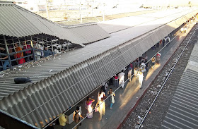 railway platform with commuters