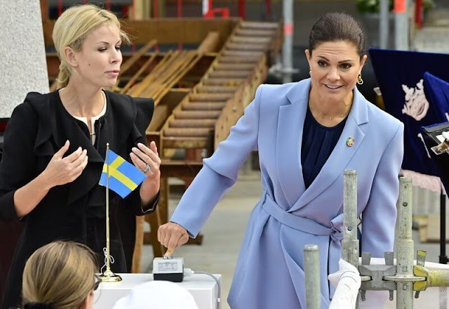 Crown Princess Victoria wore a light blue ayden wrap blazer, suit, jacket trousers by Andiata, gold earrings