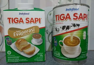 Tiga Sapi Susu Evaporasi dan Tiga Sapi Kental Manis